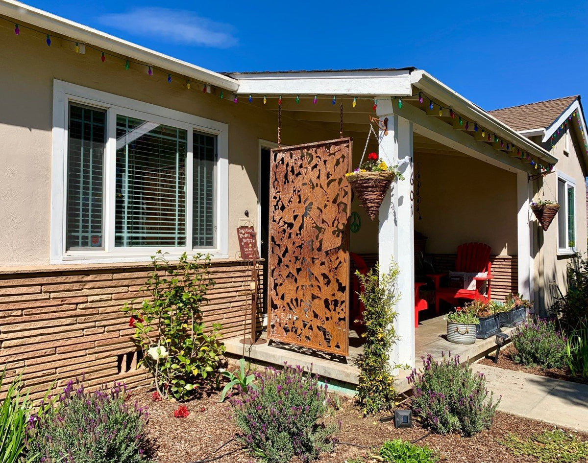Outdoor Privacy Screen metal panel by Rustica Ornamentals in rust finish with floral cutouts on Tampa Home & Garden Store