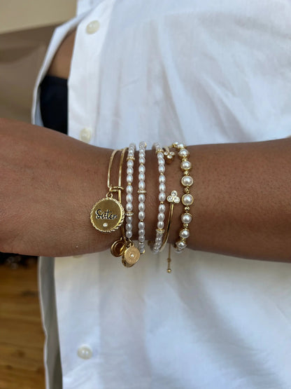Freshwater Pearl Bracelet stack featuring white pearls, gold-tone beads and delicate charms on Tampa Home & Garden Store