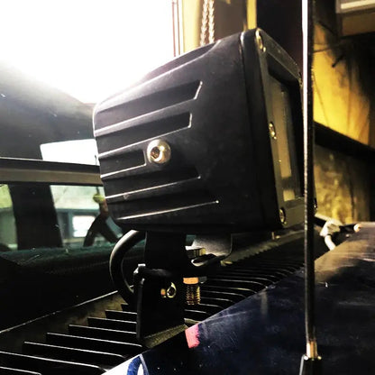 Hood light mounts Apoc Industries, black aluminum ditch-light housing with bracket on C/K hood on Tampa Home & Garden Store