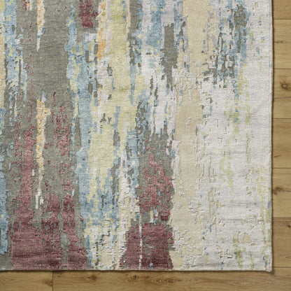 Kabugao Handmade Premium Wool Rug abstract multicolor pattern in beige blue gray tones on wood floor on Tampa Home & Garden Store
