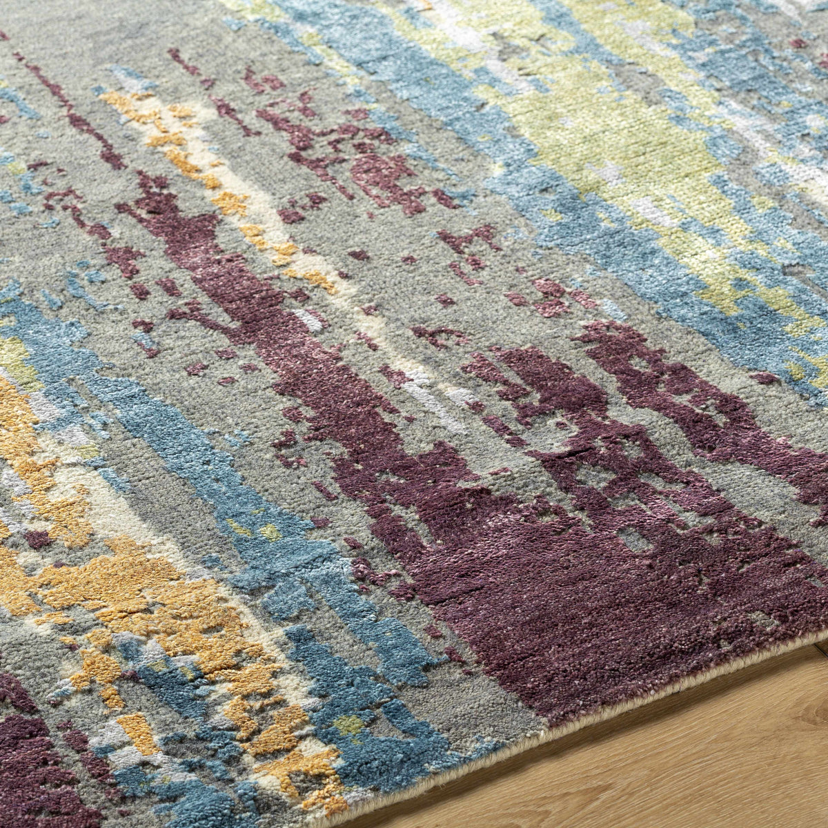 Kabugao Handmade Premium Wool Rug by Boutique Rugs in blue yellow burgundy abstract pattern on Tampa Home & Garden Store