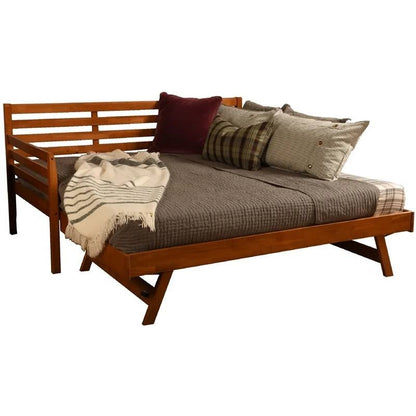 Cama de día con estructura de madera maciza con cama nido extraíble elevable en marrón medio