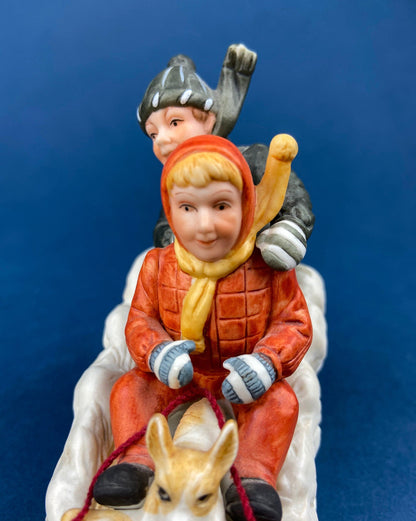 Kids & Dog on Sled Porcelain Figurine. Christmas. Downhill Racer. Inspired by Norman Rockwell. Museum Collections. Snow King. Collectibles. - Tampa Home & Garden Store