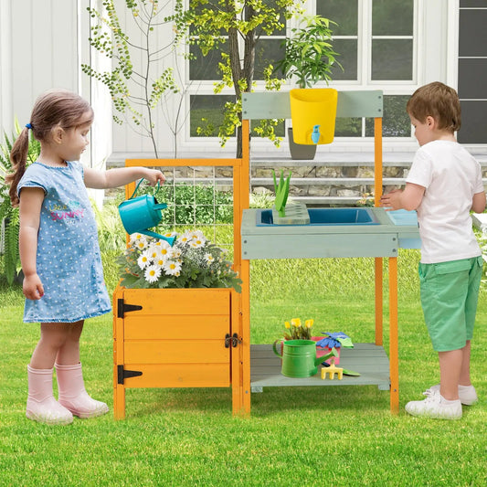 Kids outdoor potting bench with see-through window, orange frame and blue sink on Tampa Home & Garden Store