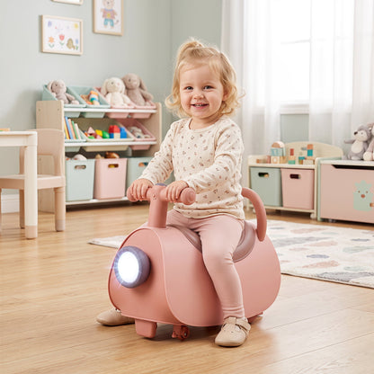 Kids push ride-on car in pink plastic with front headlight for toddlers on Tampa Home & Garden Store