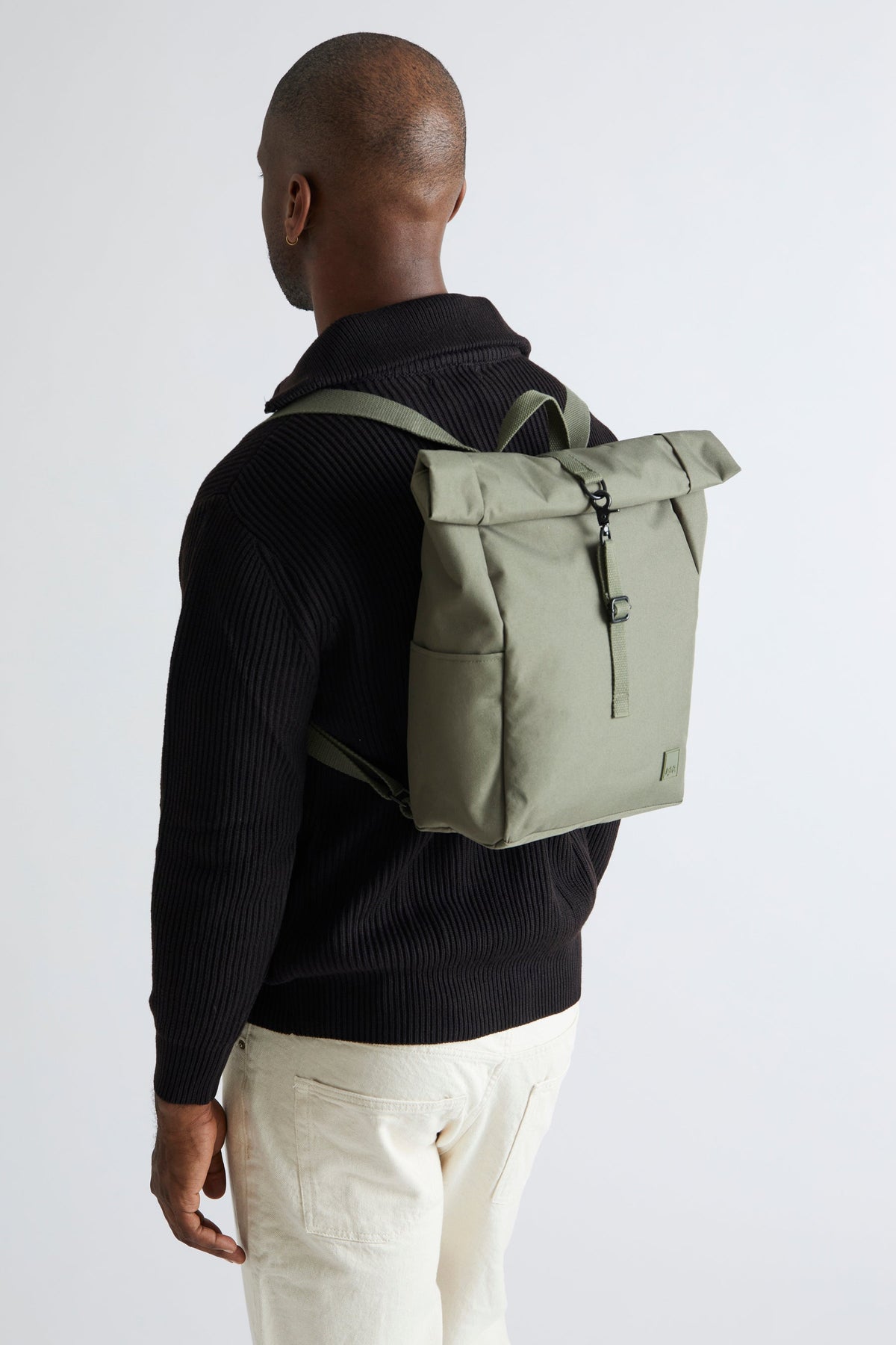 Roll Mini Olive Backpack with Laptop Sleeve by Lefrik USA in olive green fabric back view on Tampa Home & Garden Store