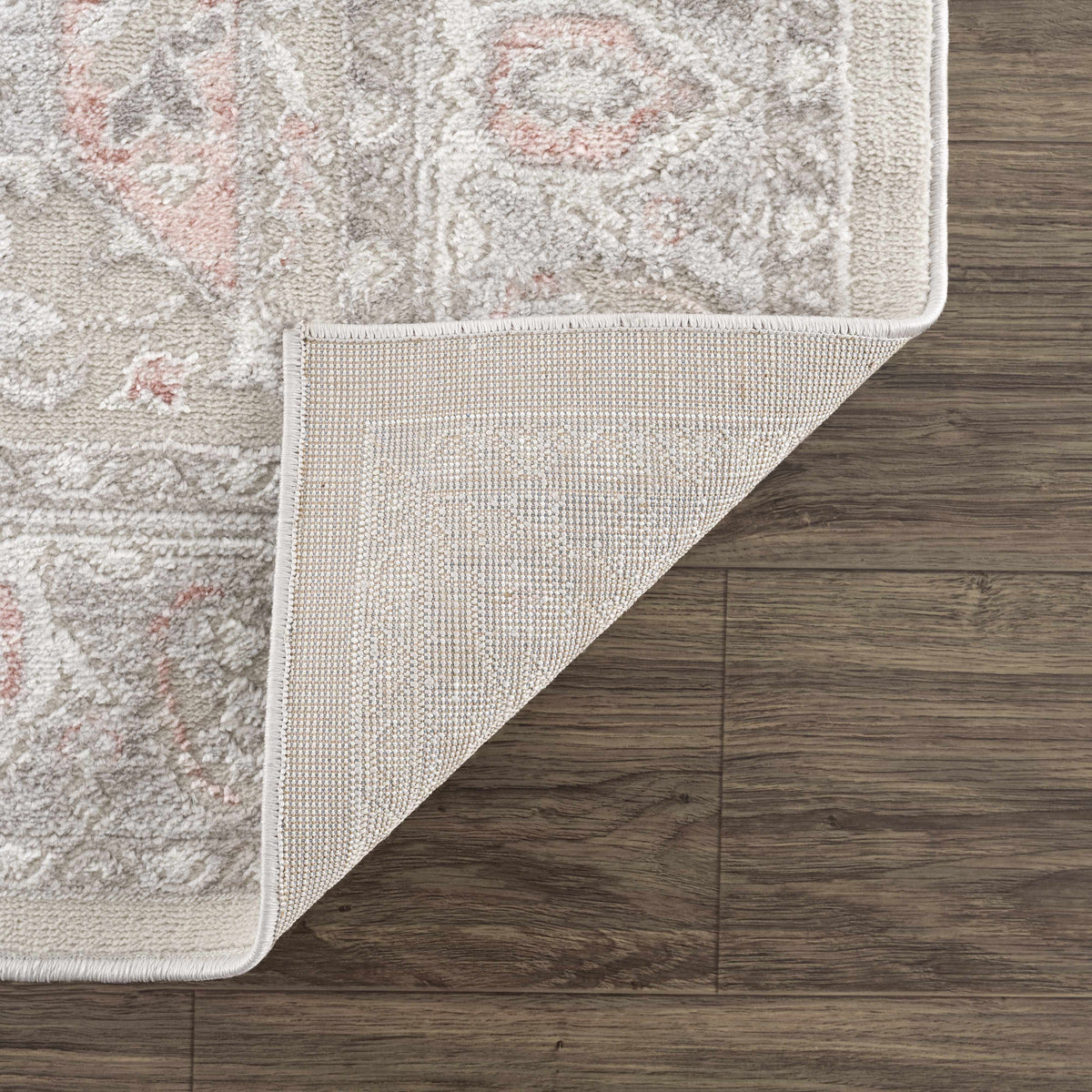 Damla Area Rug in soft ivory with blush pink accents; plush shag pile on Tampa Home & Garden Store
