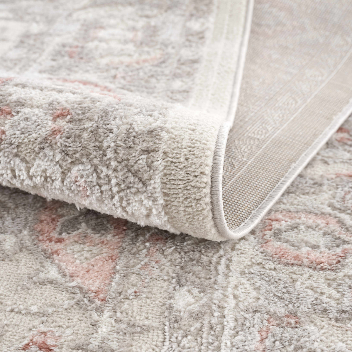 Damla Area Rug plush cream pile with soft pink accents on Tampa Home & Garden Store