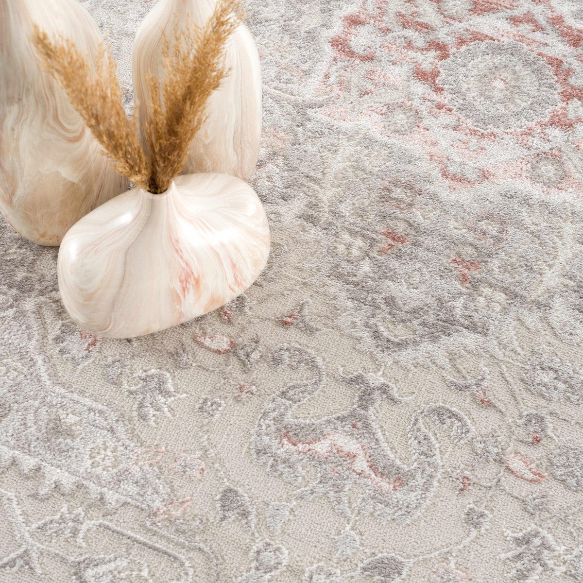 Damla Area Rug by Boutique Rugs beige gray with pink accents, set of 3 beige vases on Tampa Home & Garden Store