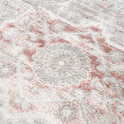 Damla area rug by Boutique Rugs in soft gray and pink tones with plush pile on Tampa Home & Garden Store