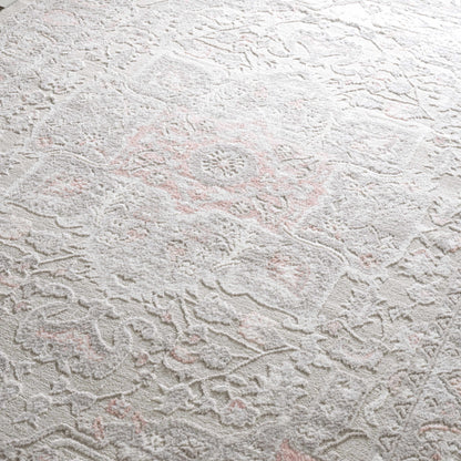 Damla Area Rug by Boutique Rugs, ivory with pink accents, plush distressed floral motif on Tampa Home & Garden Store