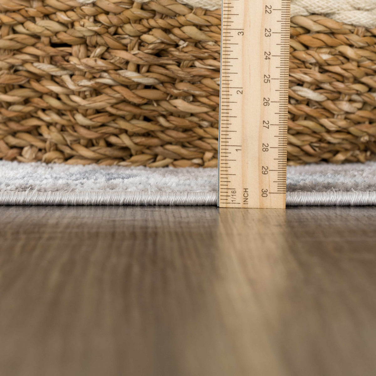Calum blue gray area rug by Boutique Rugs, woven natural fiber with ruler for scale on Tampa Home & Garden Store