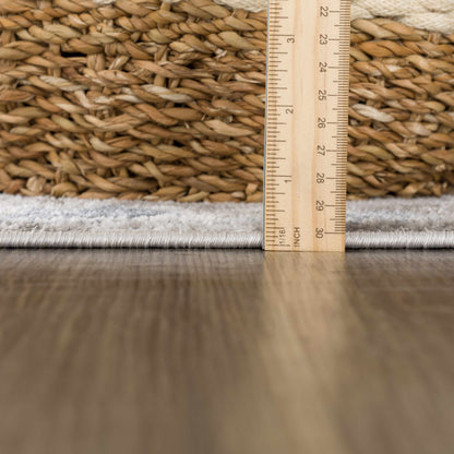 Calum blue gray area rug by Boutique Rugs, woven natural fiber with ruler for scale on Tampa Home & Garden Store