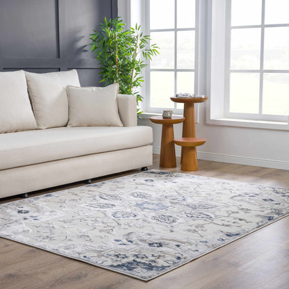 Calum Blue & Gray Area Rug by Boutique Rugs in soft blue-gray with subtle pattern on Tampa Home & Garden Store