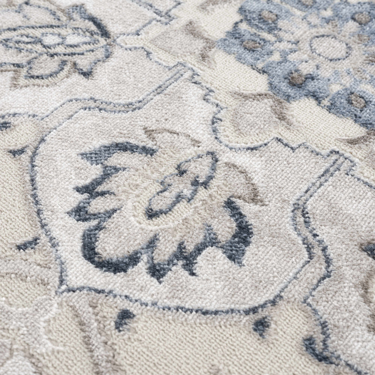 Calum blue & gray area rug with abstract pattern on Tampa Home & Garden Store