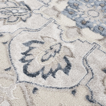 Calum blue & gray area rug with abstract pattern on Tampa Home & Garden Store