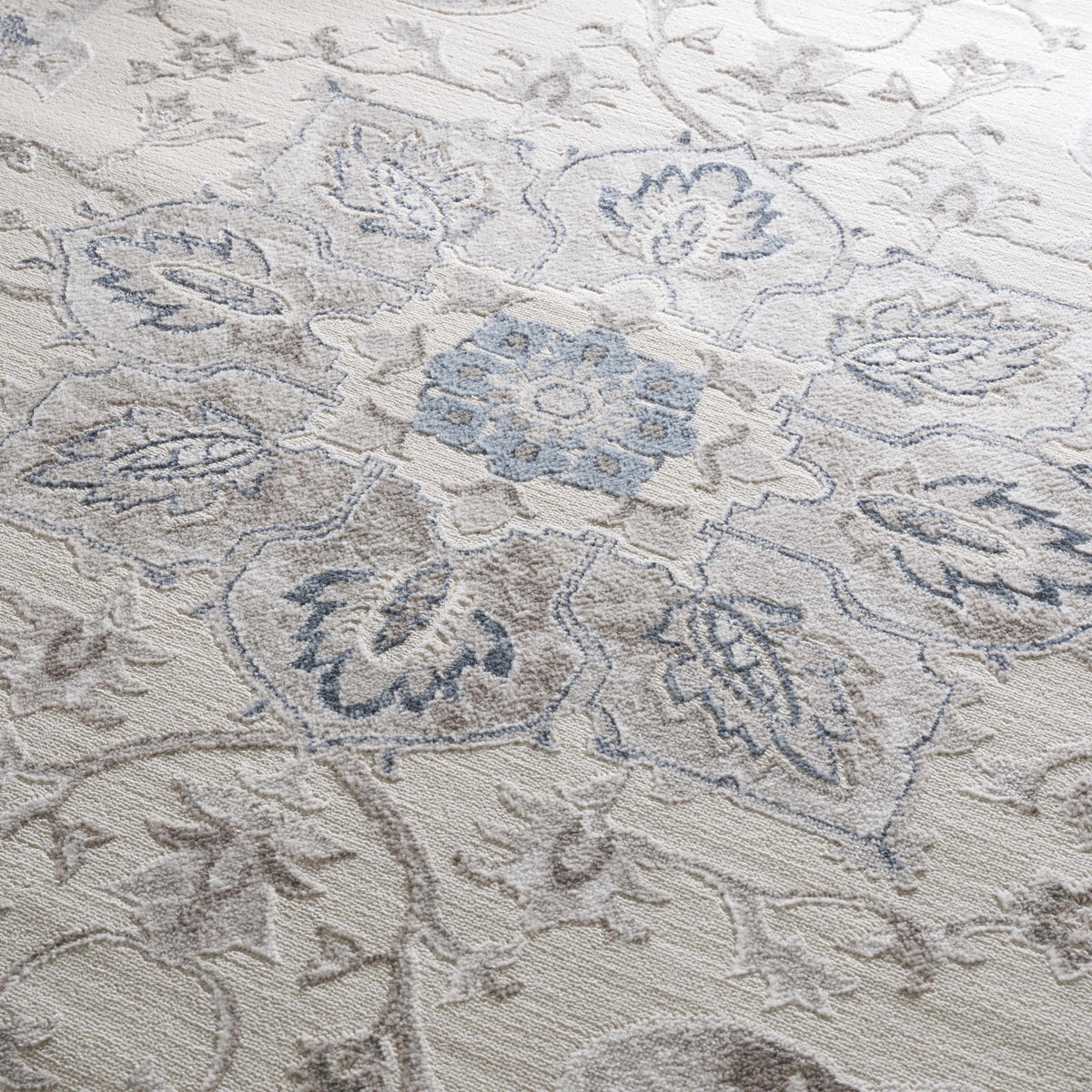 Calum blue & gray area rug by Boutique Rugs, light background with blue-gray pattern on Tampa Home & Garden Store