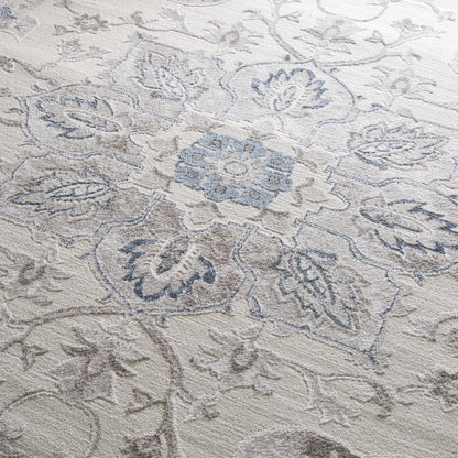 Calum blue & gray area rug by Boutique Rugs, light background with blue-gray pattern on Tampa Home & Garden Store