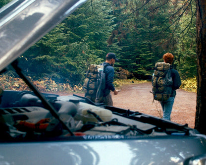 LifePack backpacking kit River Country Gear; two hikers with olive backpacks on a forest trail on Tampa Home & Garden Store