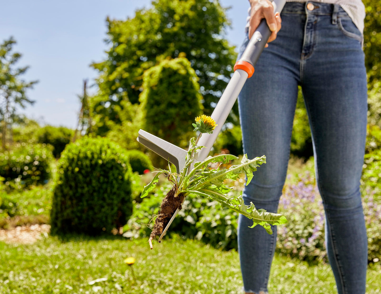 Gardena weed puller hand tool with grey handle and orange collar for garden cultivation on Tampa Home & Garden Store