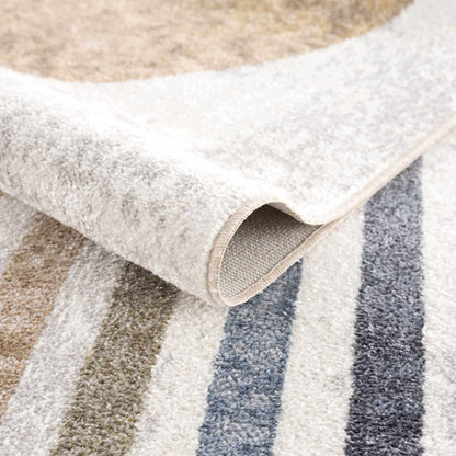 Giza Washable Area Rug from Boutique Rugs, plush beige gray pile with folded edge on display on Tampa Home & Garden Store