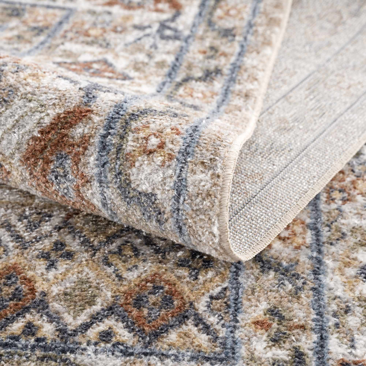 Erez Flat Pile Washable Rug with beige blue-gray and brown tones in a multicolor pattern on Tampa Home & Garden Store