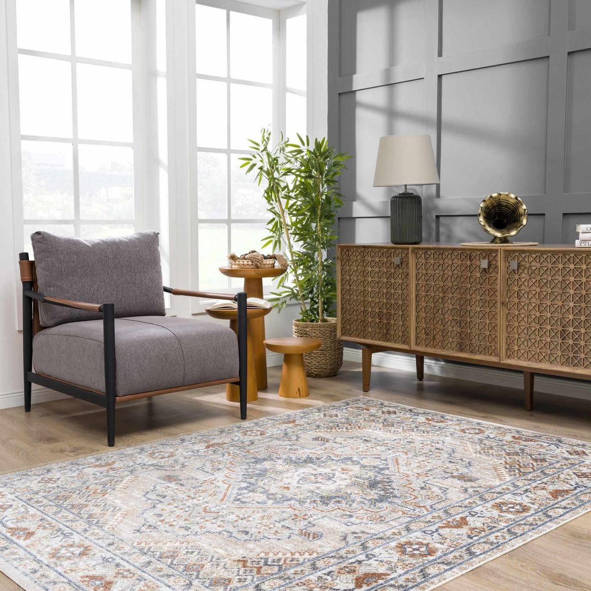 Erez Flat Pile Washable Rug by Boutique Rugs in ivory and blue with an orange geometric pattern on Tampa Home & Garden Store
