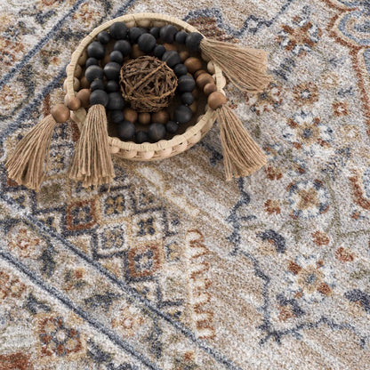 Erez Flat Pile Washable Rug in beige blue tones with a textured pattern Boutique Rugs on Tampa Home & Garden Store