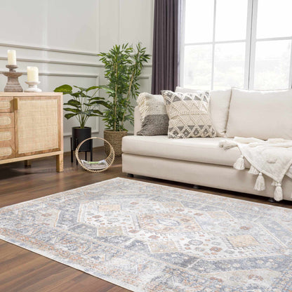 Afya Boutique Washable Rug, blue gray geometric area rug by Boutique Rugs in living room on Tampa Home & Garden Store