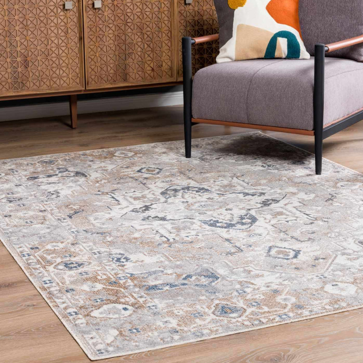 Dobry Boutique Washable Rug by Boutique Rugs, beige-gray distressed pattern on light floor on Tampa Home & Garden Store
