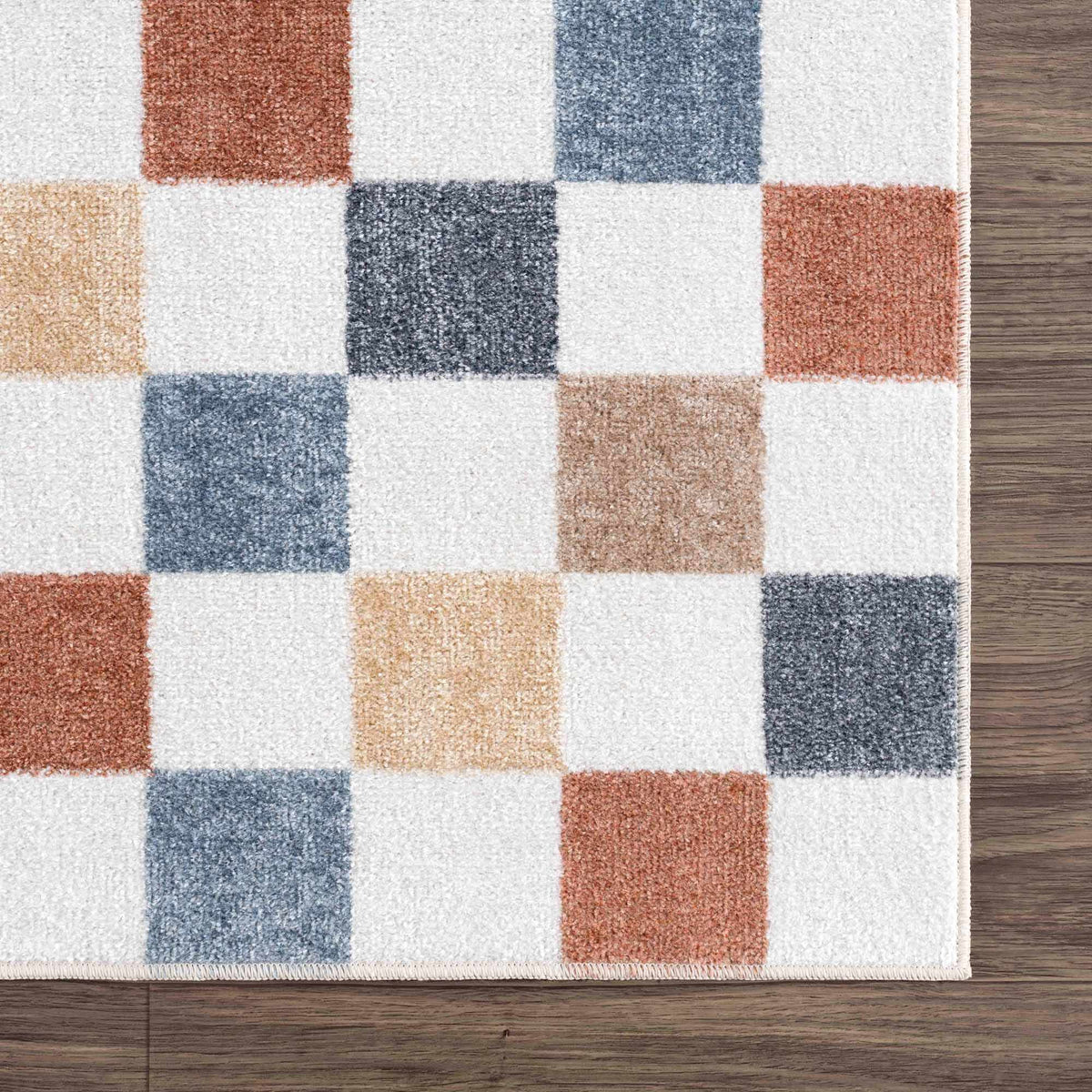 Alie Colorful Checkered Washable Rug with rust navy tan blocks; fringe edge Boutique Rugs on Tampa Home & Garden Store