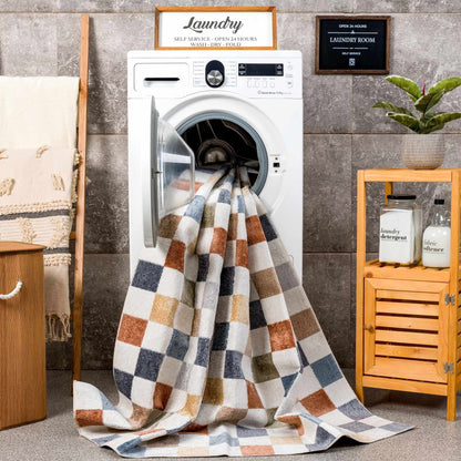 Alie Colorful Checkered Washable Rug Boutique Rugs blue tan checks over washing machine on Tampa Home & Garden Store
