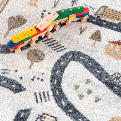 Mave Roads washable rug for kids beige road-pattern rug with dark print and a wooden toy train on Tampa Home & Garden Store