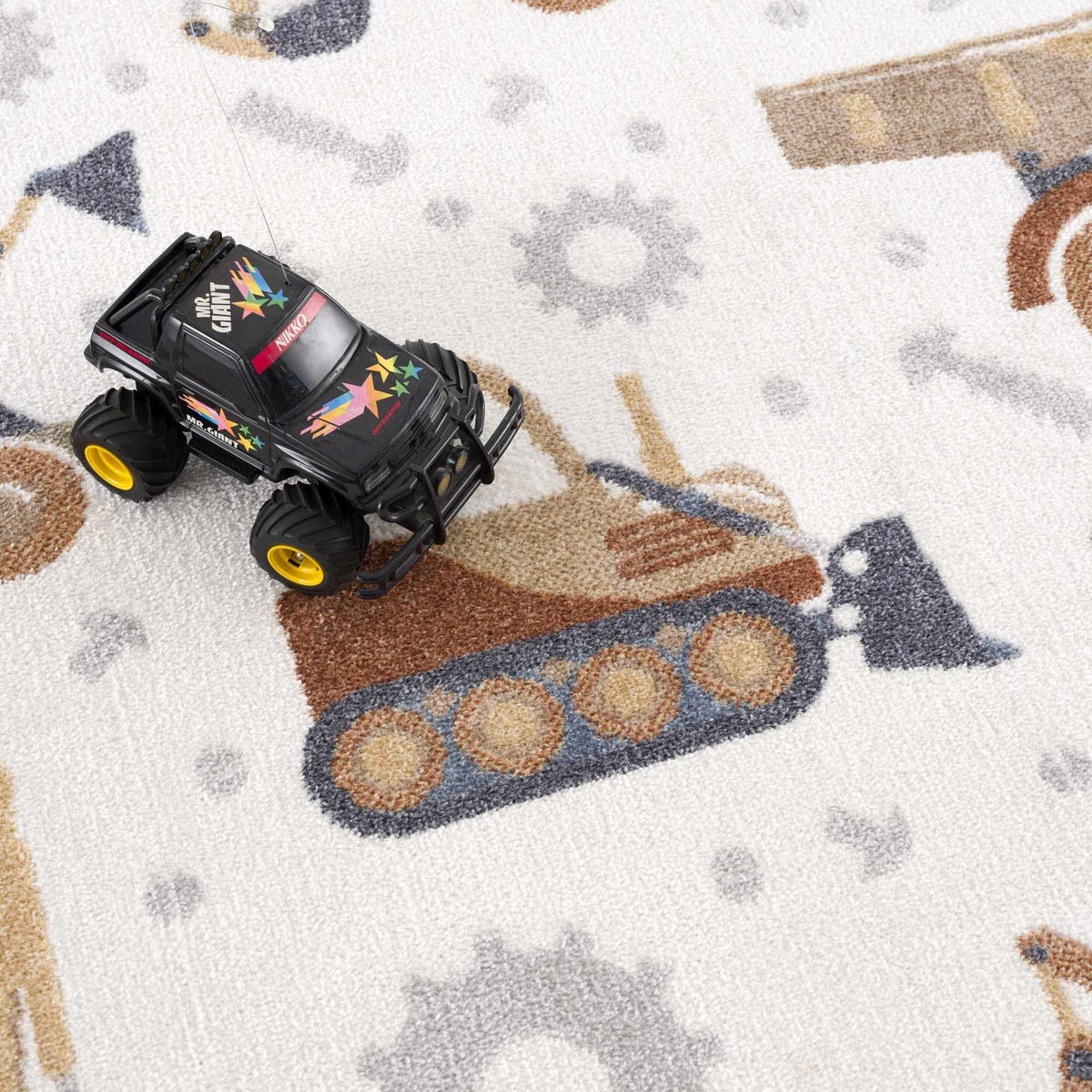 Construction Washable Kids Area Rug cream backdrop with tan blue accents on Tampa Home & Garden Store
