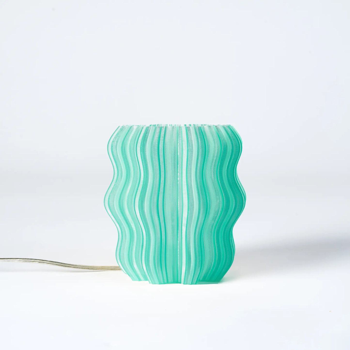 Mini Wavy Lamp by Wooj Design, teal ribbed glass table lamp on Tampa Home & Garden Store