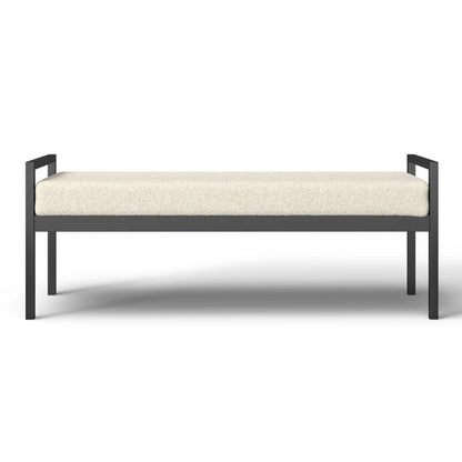 Banco de cama industrial moderno con estructura de metal negro y cojín tapizado crema