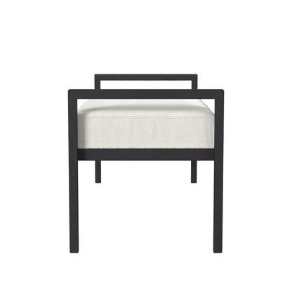 Banco de cama industrial moderno con estructura de metal negro y cojín tapizado crema