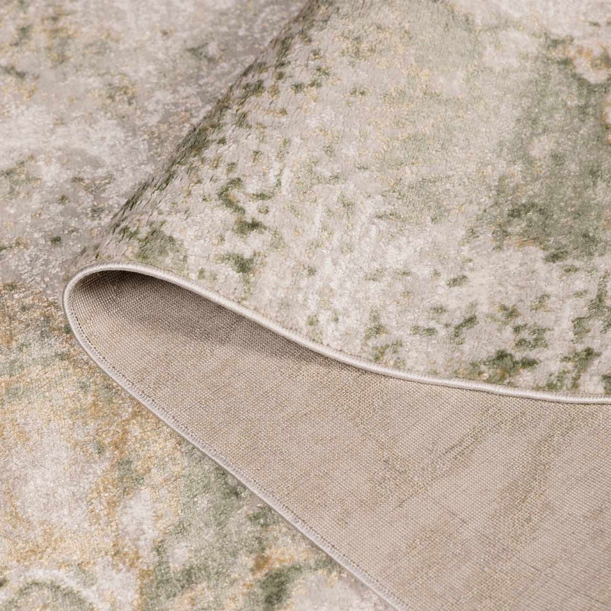 Lively Marble Green Area Rug by Boutique Rugs, green beige distressed pattern with beige backing on Tampa Home & Garden Store