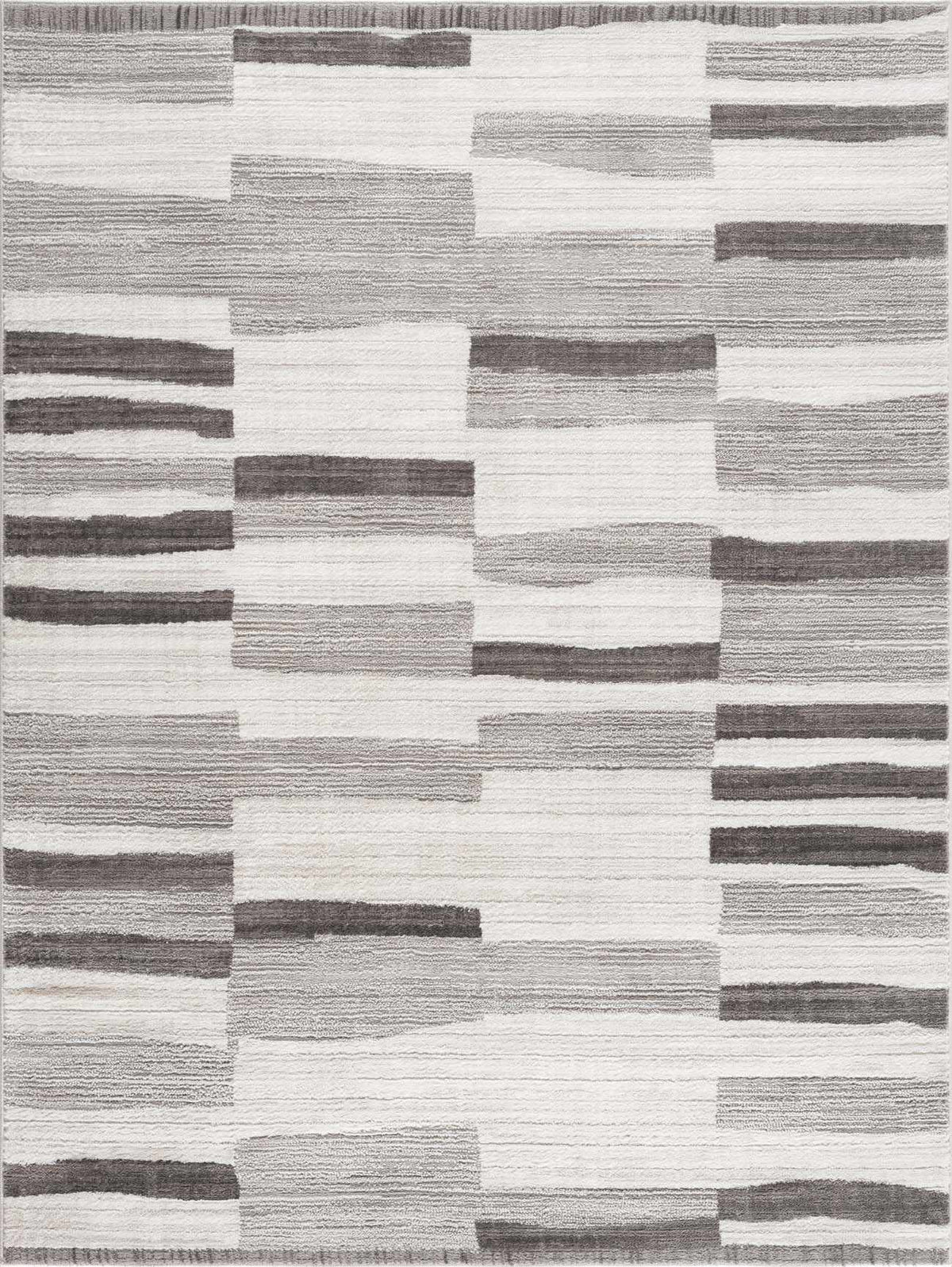 Bojana broken-striped area rug by Boutique Rugs in cream and gray geometric blocks on Tampa Home & Garden Store