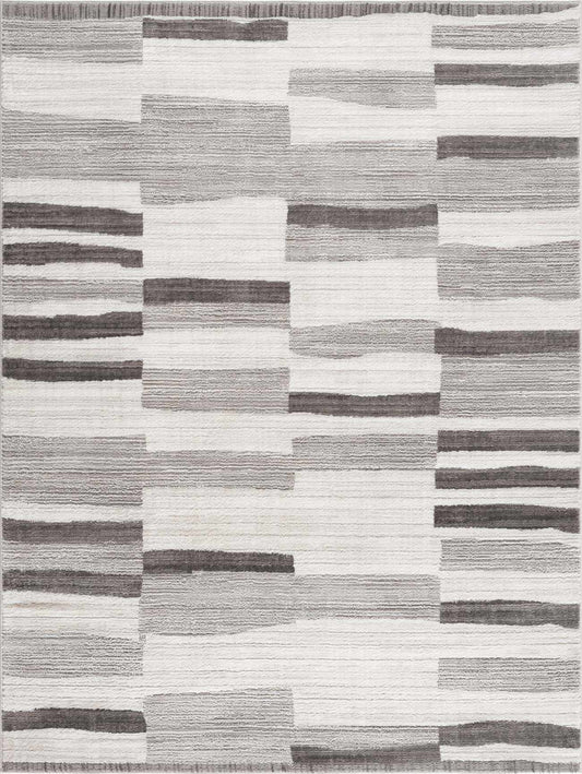 Bojana broken-striped area rug by Boutique Rugs in cream and gray geometric blocks on Tampa Home & Garden Store