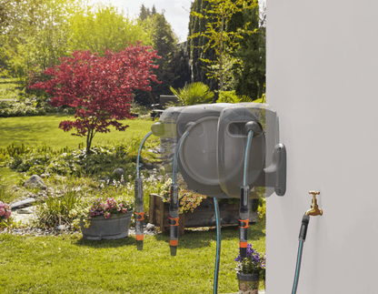 Gardena RollUp 50 ft retractable hose reel with auto retracting system mounted on wall on Tampa Home & Garden Store