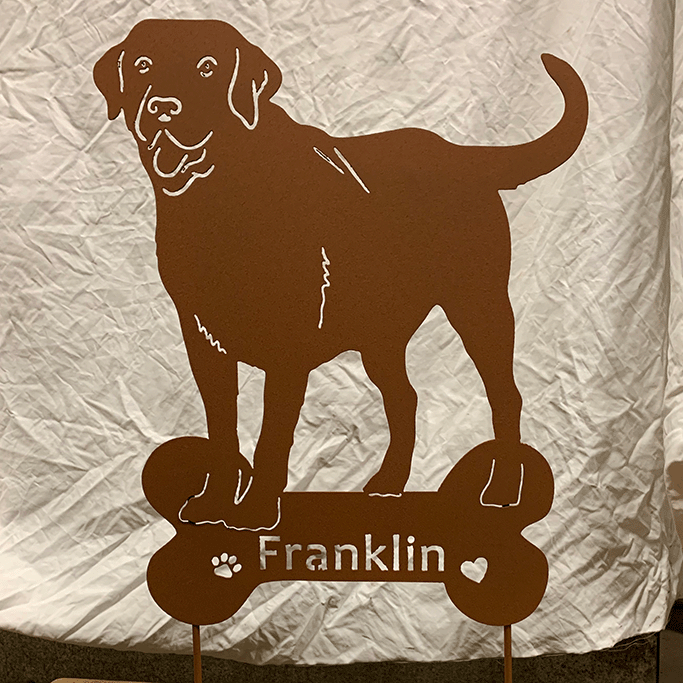 Labrador metal statue in brown on bone-shaped base with Franklin on Tampa Home & Garden Store