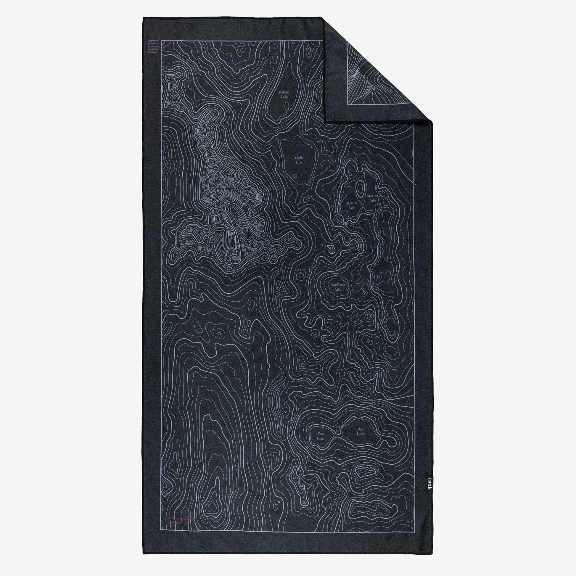 Terrain Towel by Laek in dark navy with topo contour lines, folded display on Tampa Home & Garden Store