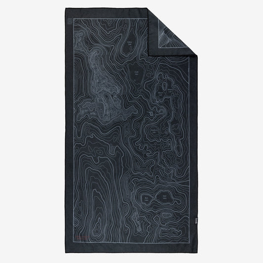 Terrain Towel by Laek in dark navy with topo contour lines, folded display on Tampa Home & Garden Store