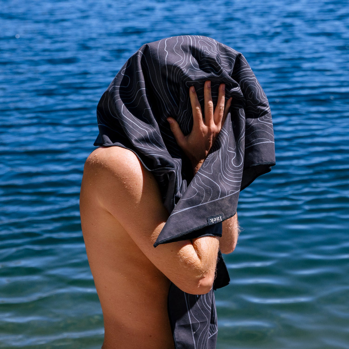 Terrain Towel by Laek, dark charcoal with white contour lines on Tampa Home & Garden Store