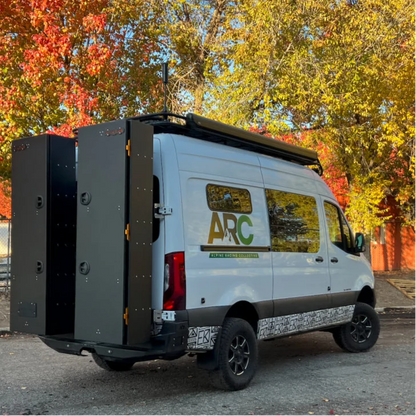 Avatar Ski 6 Storage Box pair, two black ski storage boxes mounted on rear doors of a white van on Tampa Home & Garden Store