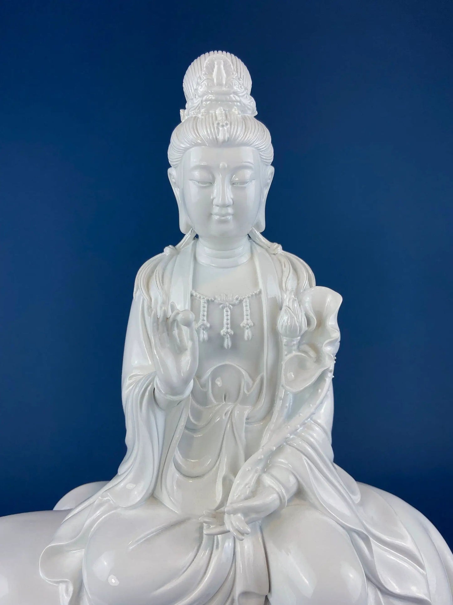 White Buddha Samantabhadra figurine on elephant, serene glossy ceramic statue on Tampa Home & Garden Store