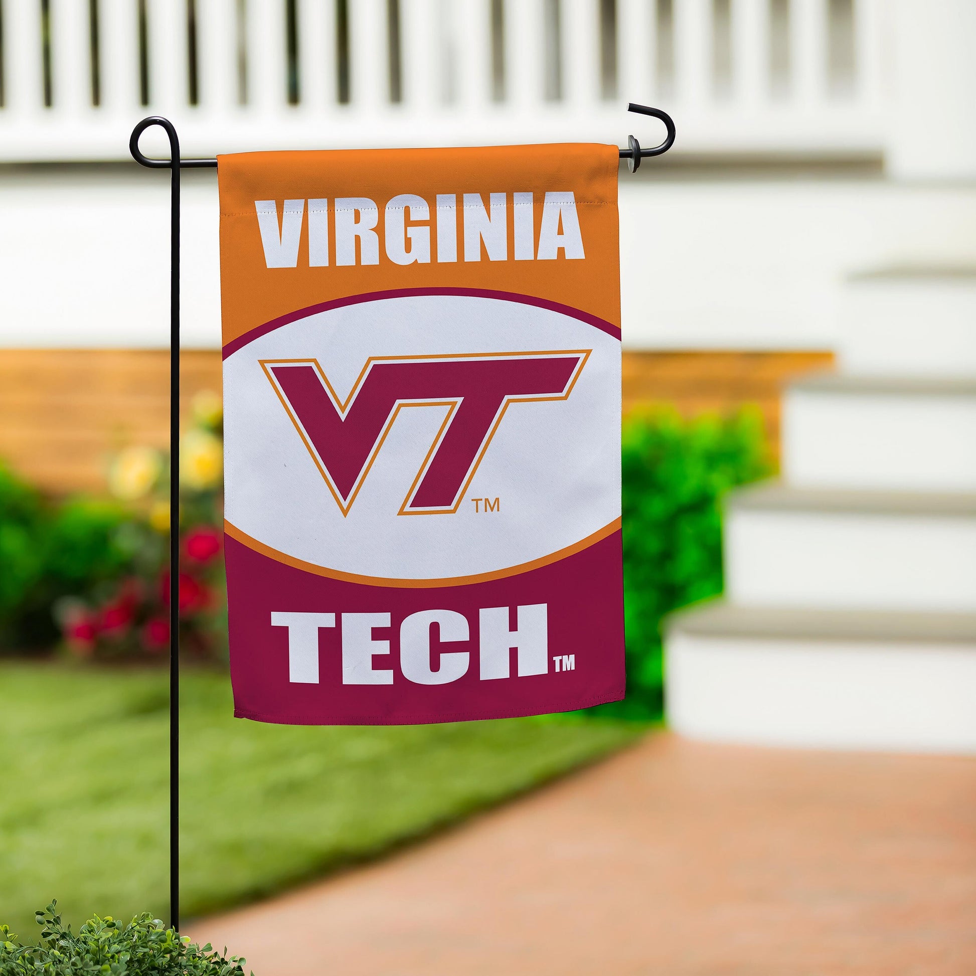 Virginia Tech suede flag orange banner with white VIRGINIA text and VT logo on black stake on Tampa Home & Garden Store
