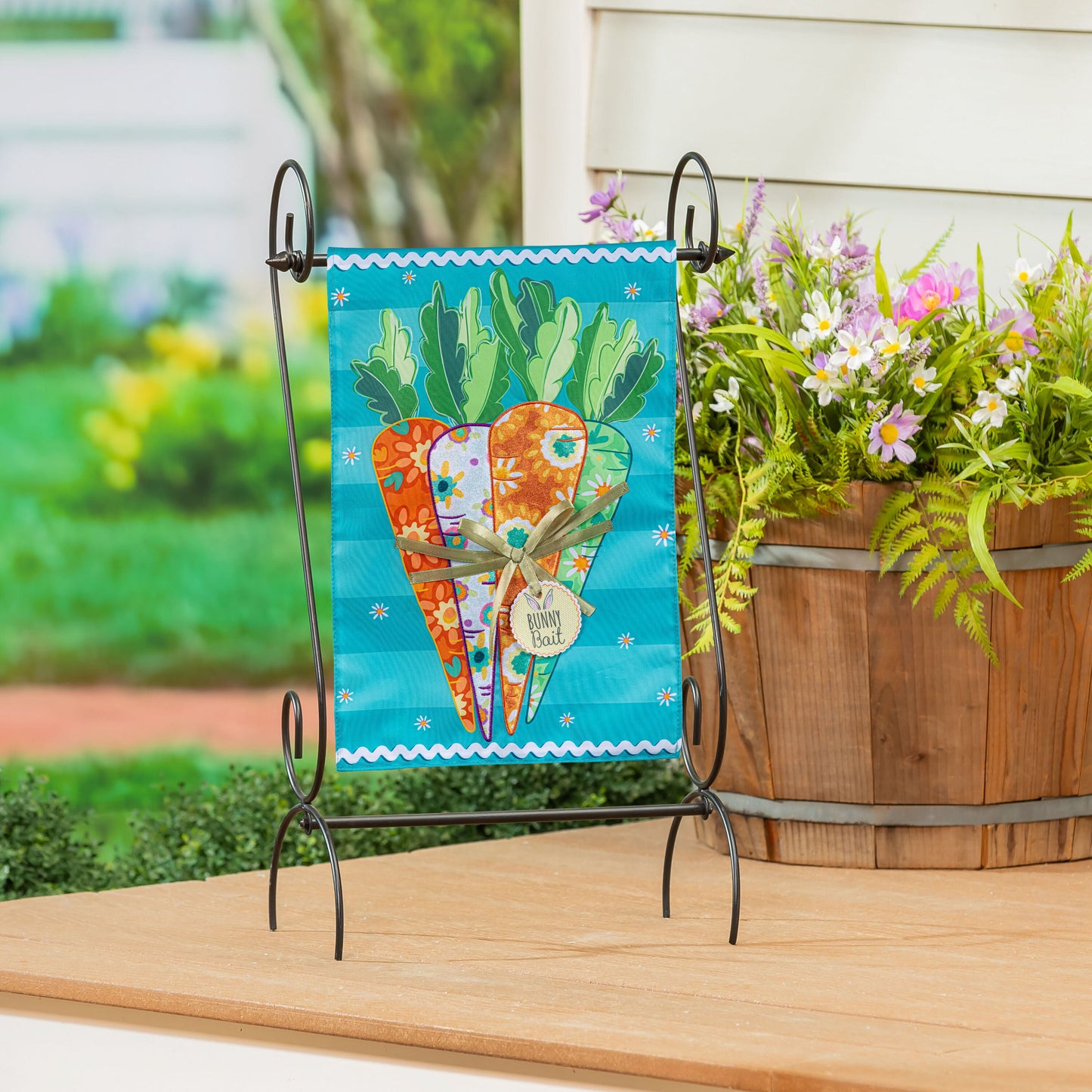 Applique garden flag Bunny Bait Bunch with colorful carrot motif on turquoise background on Tampa Home & Garden Store