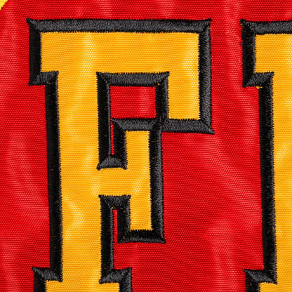 Fire Department Garden Applique Flag close-up of yellow F with black border on red background on Tampa Home & Garden Store